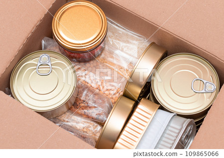 Carton Box with Canned Food, Cereals and Grocery - Donation Box or Food Reserves 109865066