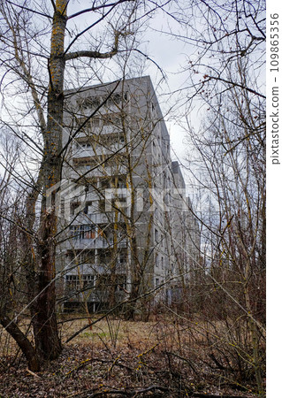 ruins of a very heavily polluted place, known as one of the most polluted towns in Europe. Abandoned building in Pripyat. Old buildings in the Chernobyl resettlement zone. 109865356