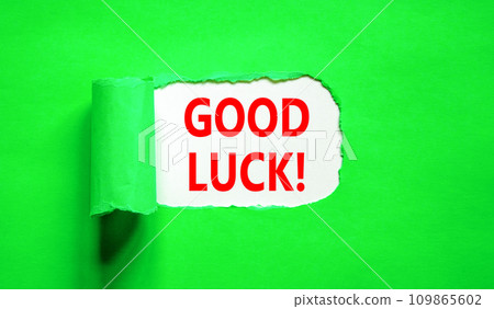 Good luck symbol. Concept words Good luck on beautiful white paper. Beautiful green table green background. Business, motivational good luck concept. Copy space. 109865602