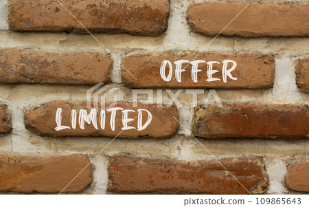 Limited offer symbol. Concept words Limited offer on beautiful brown bricks. Beautiful brick wall background. Beautiful brick wall. Business marketing, motivational Limited offer concept. Copy space. 109865643