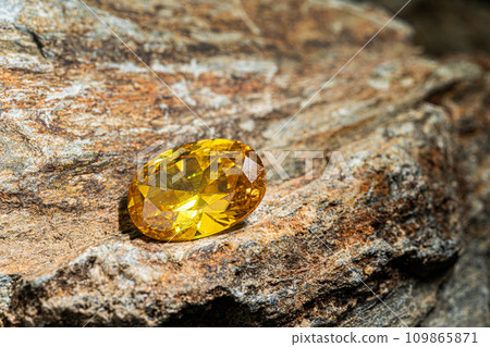 Natural yellow Sapphire gemstone, Jewel or gems on stone, close up shot 109865871