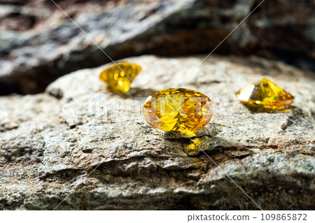 Natural yellow Sapphire gemstone, Jewel or gems on stone, close up shot 109865872