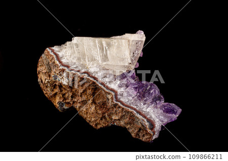 macro mineral amethyst stone with calcite black background 109866211