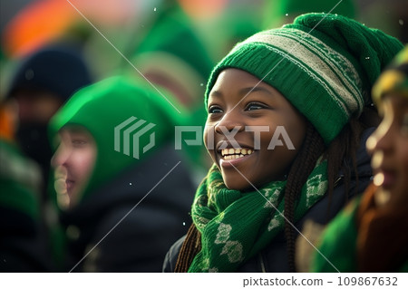 St. Patricks Day celebration. A joyful young boy in vivid green attire, exuding excitement and cheer 109867632