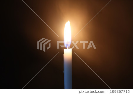 candles on black background candles on black background 109867715