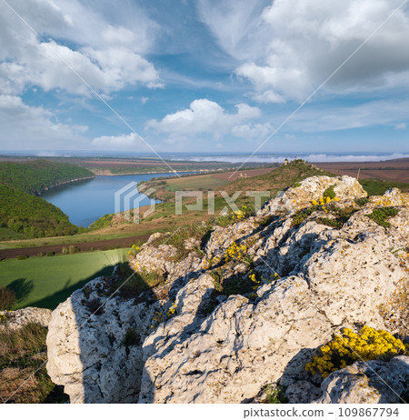 Ukraine without russian aggression. Amazing spring view on the Dnister River Canyon with picturesque rocks, fields, flowers. This place named Shyshkovi Gorby,  Nahoriany, Chernivtsi region, Ukraine. 109867794