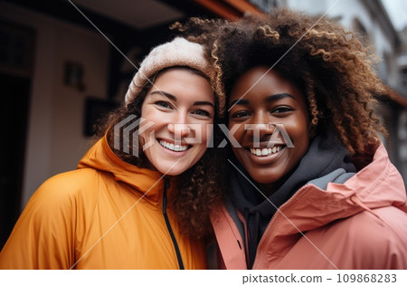 two African women standing in front of the camera taking a selfie 109868283