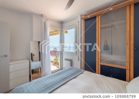 Stylish bedroom with entrance on terrace in guest house Stylish bedroom with entrance on terrace in guest house 109868799