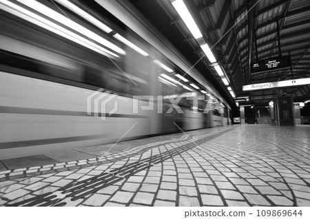 Greyscale long shutter speed shot of an empty train station in Gelsenkirchen, Germany Greyscale long shutter speed shot of an empty train station in Gelsenkirchen, Germany 109869644