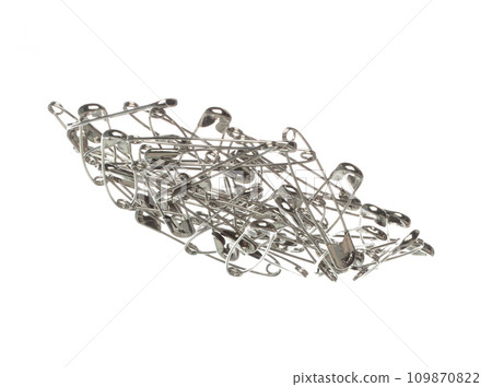 Safety Pin brooch pour fall down, explosion in air. Many safety pin big size splash fly in group floating. White background isolated high speed shutter freeze motion Safety Pin brooch pour fall down, explosion in air. Many safety pin big size splash fly in group floating. White background isolated high speed shutter freeze motion 109870822