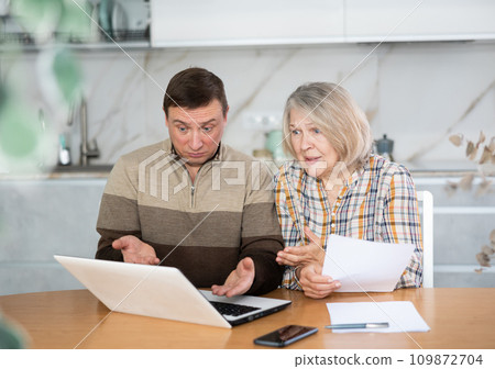 Old woman considering offer from agent Old woman considering offer from agent 109872704