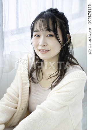 A fluffy girl with a feminine atmosphere relaxing in her room A fluffy girl with a feminine atmosphere relaxing in her room 109879126