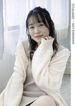 A fluffy girl with a feminine atmosphere relaxing in her room 109879131