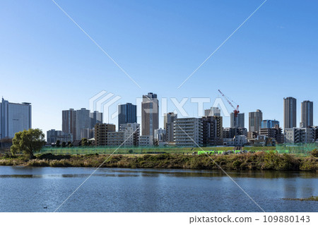 Cityscape across the Tama River Cityscape across the Tama River 109880143