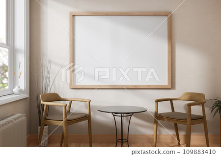 A beautiful Scandinavian living room with a table and wooden armchairs and a frame mockup on a wall. 109883410