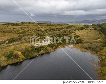 Aerial of lake in a peatbog by Clooney, Portnoo - County Donegal, Ireland. 109887274
