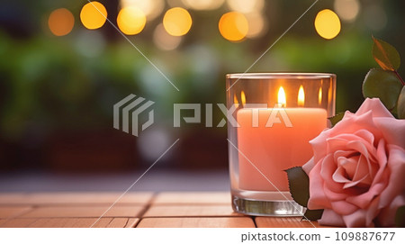 AI-generated content. A burning candle and rose flowers against the background of a garden. Banner with copy space. Self care and aromatherapy concept. 109887677