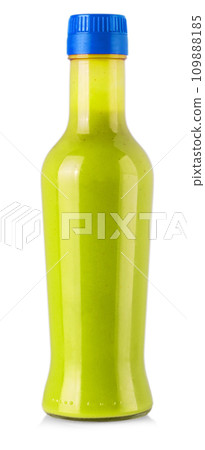 Bottle of hot sauce is spilling liquid on white background with clipping path 109888185