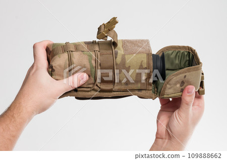 The bag is a military-style pixel case for storing a monocular. 109888662