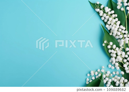 Lily of the valey bunch on blue mint background top view 109889682