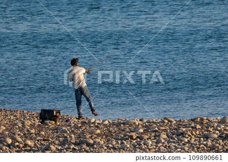Enjoy fishing in the sea 109890661