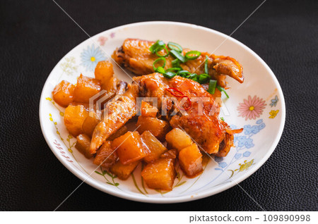 Stir-fried chicken wings with daikon radish Stir-fried chicken wings with daikon radish 109890998