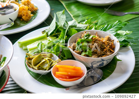 Spicy minced fish salad in dish. Thai food Spicy minced fish salad in dish. Thai food 109892427