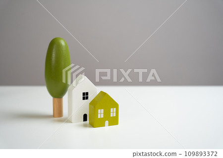 Houses and trees, figures. Villages and towns. Country house. Environmental friendliness and autonomy of housing. High energy saving technologies, in harmony with nature. 109893372