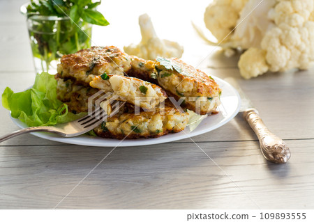 cooked vegetarian fried cauliflower cutlets in a plate cooked vegetarian fried cauliflower cutlets in a plate 109893555