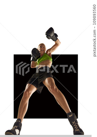 Bottom view. Sportive young woman, boxing athlete in motion, training, punching isolated over white background. Poster Bottom view. Sportive young woman, boxing athlete in motion, training, punching isolated over white background. Poster 109893560