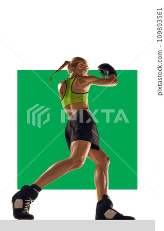 Young muscular woman with fit strong body, boxing athlete in motion, practicing over white background with green element. Poster 109893561
