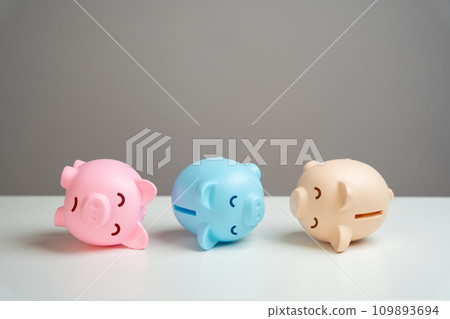 The piggy banks lie in agony. Financial crisis, end of savings, bankruptcy. Refinancing restructuring of debts. Economic depression. Depletion of savings and financial resources. Exorbitant expenses. 109893694
