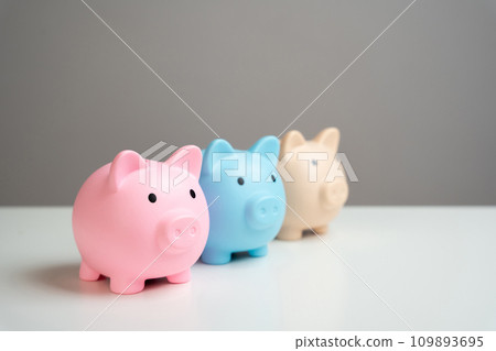 Three piggy banks. Savings and deposit banking. Healthy economy. Diversification of investments and savings. Banking. Good conditions from the bank. Increase capital. Three piggy banks. Savings and deposit banking. Healthy economy. Diversification of investments and savings. Banking. Good conditions from the bank. Increase capital. 109893695