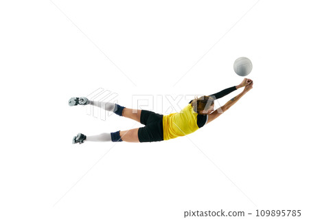 Dynamic image of young woman, volleyball player in motion, practicing, playing isolated over white background. Sport, active and healthy lifestyle 109895785