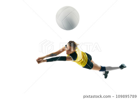 Young woman, volleyball player practicing, hitting ball in motion isolated over white background. Motivation to win. Sport, active and healthy lifestyle Young woman, volleyball player practicing, hitting ball in motion isolated over white background. Motivation to win. Sport, active and healthy lifestyle 109895789
