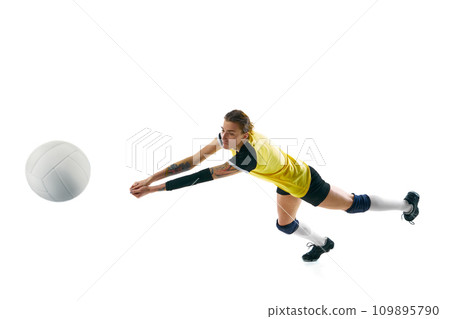 Young woman, volleyball player practicing, hitting ball in motion isolated over white background. Motivation to win. Sport, active and healthy lifestyle Young woman, volleyball player practicing, hitting ball in motion isolated over white background. Motivation to win. Sport, active and healthy lifestyle 109895790