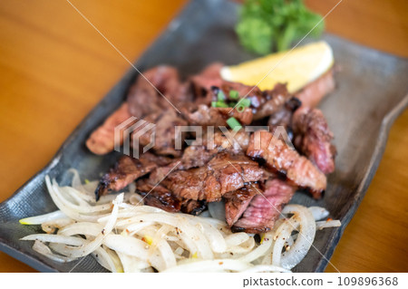Medium rare meat on plate Medium rare meat on plate 109896368