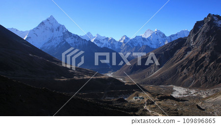 Prayer flags and Mount Ama Dablam, Nepal. 109896865