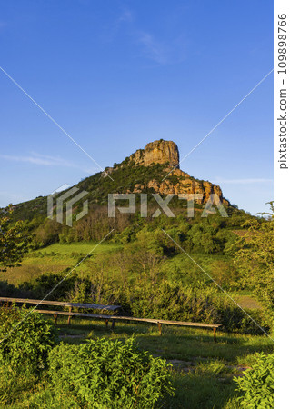 Rock of Solutre with vineyards, Burgundy, Solutre-Pouilly, France Rock of Solutre with vineyards, Burgundy, Solutre-Pouilly, France 109898766