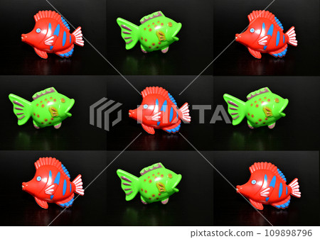A collage of 9 photographs of green and red aquarium fish was created on a black background. Created with GIMP 109898796