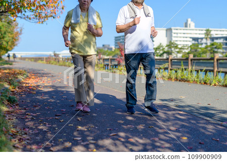 Active senior male and female couples walking for health. Diet, exercise, healthy habits, walking. 109900909