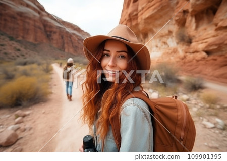 A young girl tourist takes a selfie 109901395