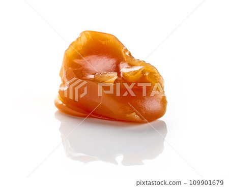 caramel candy on white background 109901679
