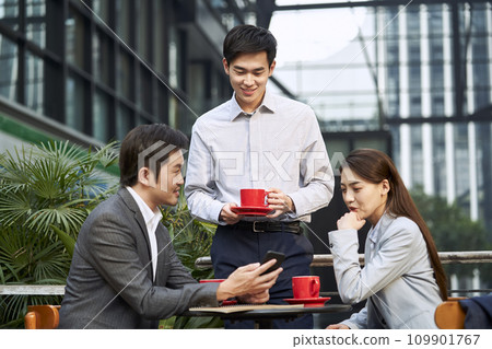 asian business people meeting in outdoor cafe asian business people meeting in outdoor cafe 109901767