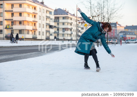 A person slipped on the snow and injured her ankle. A person slipped on the snow and injured her ankle. 109902999