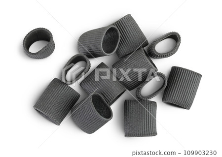 Black pasta with cuttlefish ink isolated on white background. Top view. Flat lay. Black pasta with cuttlefish ink isolated on white background. Top view. Flat lay. 109903230