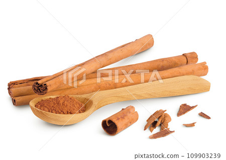 Cinnamon sticks with powder in wooden spoon isolated on white background with full depth of field Cinnamon sticks with powder in wooden spoon isolated on white background with full depth of field 109903239