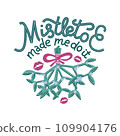 Mistletoe Made Me Do It. Funny T-shirt print. Hand-drawn lettering and illustration of mistletoe tied with pink ribbon hanging and kiss marks beside it. Isolated on white background. 109904176