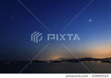 Spring starscape in Setouchi - Orion constellation sinking in the afterglow 109905929