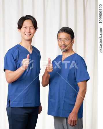 Male staff in scrubs looking at you with a smile Male staff in scrubs looking at you with a smile 109906300